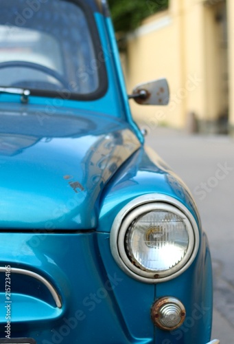An old car on the city street — retro, vintage, old‑time charm	
