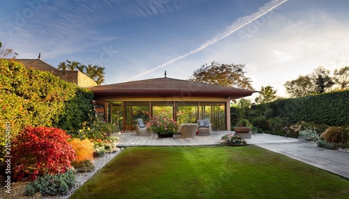 serene garden retreat highlights vibrant colors and peaceful architecture in a sunny afternoon