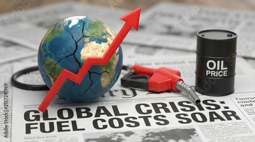  Globe with a rising price arrow and oil barrel on newspapers representing the Iran fuel crisis.