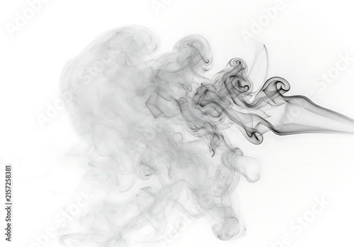 Elegant smoke rising from a delicate glass pipe with intricate design details
