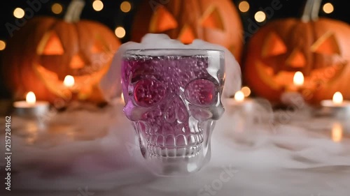 Spooky Halloween Skull Drink with Dry Ice Smoke and Pumpkins