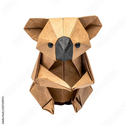 Intricately folded paper sculpture depicts a charming marsupial figure centered against a stark black background