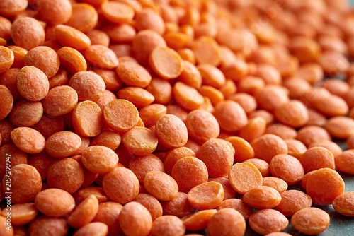 Red lentils macro pile healthy organic vegan food ingredient raw legume dry agriculture crop nutrition dietary vitamin plant background