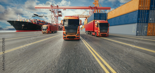 Freight Trucks at Container Port with Cargo Ship and Cranes