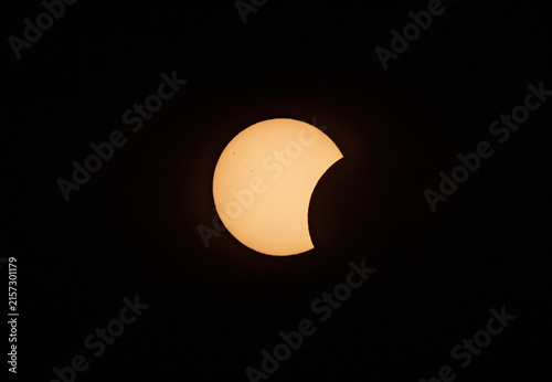 Obraz na plátne Dramatic Partial Solar Eclipse Background with Sharp Moon Silhouette