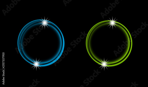 Abstract glowing blue and green oval frames featuring a bright sparkling light effect on a deep black background