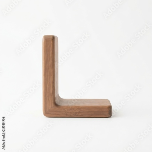 L-shaped wooden bookend on white surface