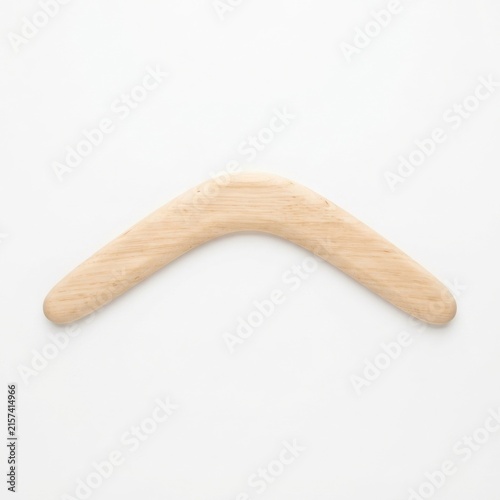 Wooden boomerang on white background