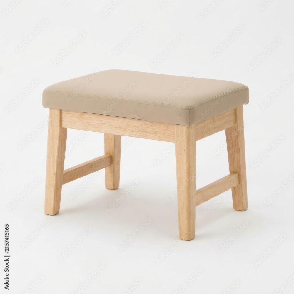 Fototapeta premium Wooden footstool with beige cushion in neutral setting