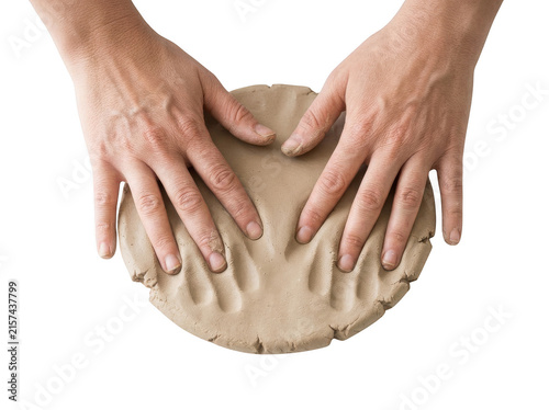 Hands modeling clay on a flat surface isolated on transparent background
