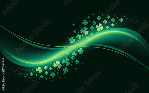 Abstract green clover leaves with glowing particles and dynamic light wave on black background