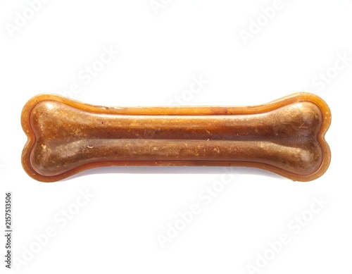 Side view of brown textured dog bone.