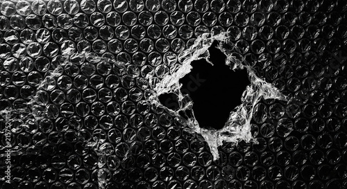 Damaged Bubble Wrap With A Large Tear and Bursted Bubbles