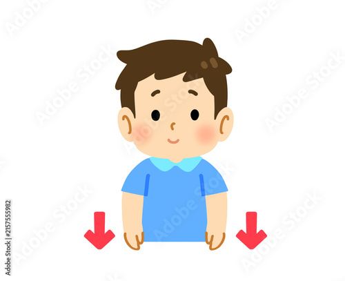 両手を下に下げる男の子