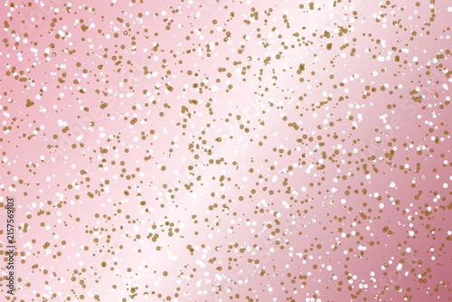 Rose gold festive background with sparkling metallic confetti dust effect.