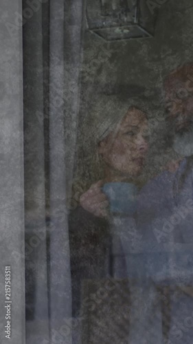 Animation of moving background over sad senior diverse couple embracing