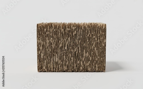 Vertical stack of dense corrugated cardboard sheets showing rough paper edge texture for industrial supply concept.