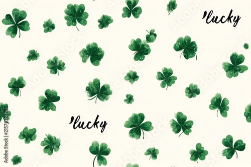 A vibrant pattern of green shamrocks and lucky quotes on a light background ideal for St Patricks Day themed designs and celebration projects. Generative AI