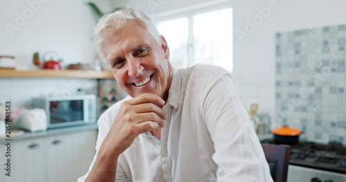 Bild auf Leinwand Portrait, smile and senior man relax in home with positive attitude, retirement wellness and peace