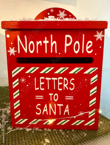 red santa mailbox with snow and lights, copyspace, concept of christmas, retail