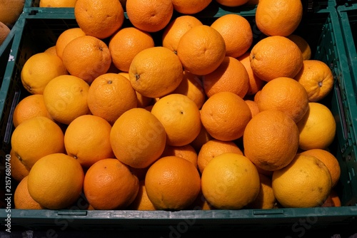 Bild auf Leinwand Fresh Oranges in Crate at Supermarket