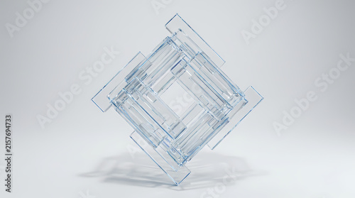 A complex geometric cube structure is meticulously assembled from clear glass pieces.