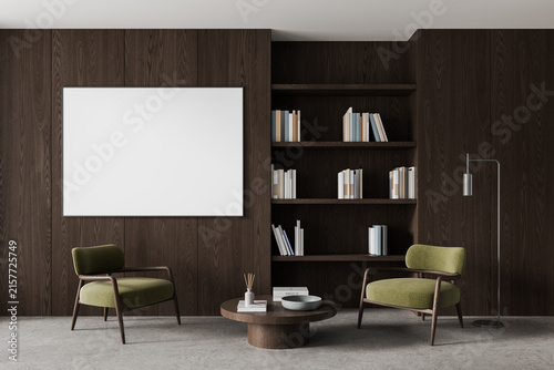 Elegant dark wood living room interior with empty framed poster mockup  bookshelves  lounge chairs  coffee table  and floor lamp. 3D Rendering
