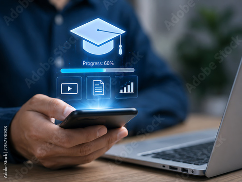 Online learning concept with a student using a smartphone and laptop with graduation cap overlay