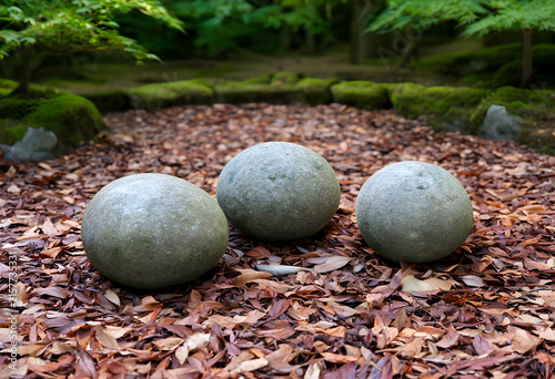 Three round mossy garden st...