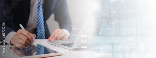 Business Finance Analytics With Tablet Laptop and Digital Charts