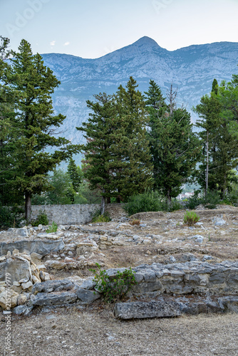 Photography Ancient Ruins Set Against Majestic Mountain Range