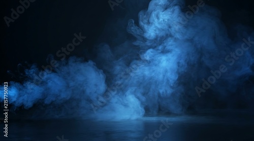 Thick blue smoke swirling against a dark black background
