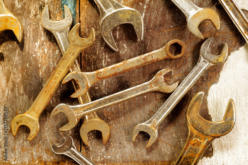 Old pliers on a wooden floor