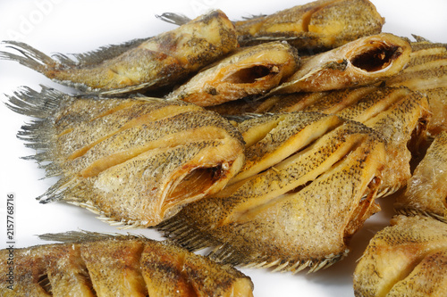fried gourami fish on white background