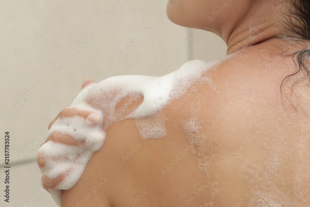 Fototapeta premium Close Up of Bath Foam on Skin During Bathing 