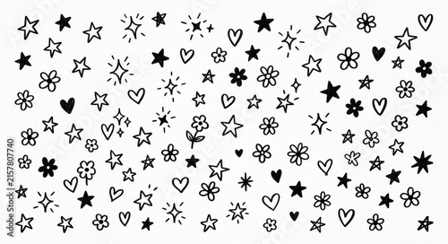 Foto Hand drawn star and heart doodles