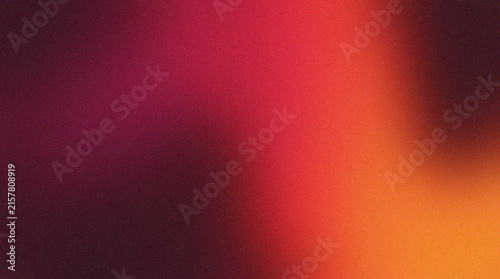 Abstract red and orange gradient background with soft grainy texture for modern design