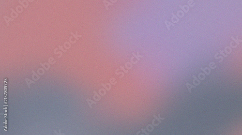 Abstract grainy gradient background with soft pink and purple blurred color transitions.