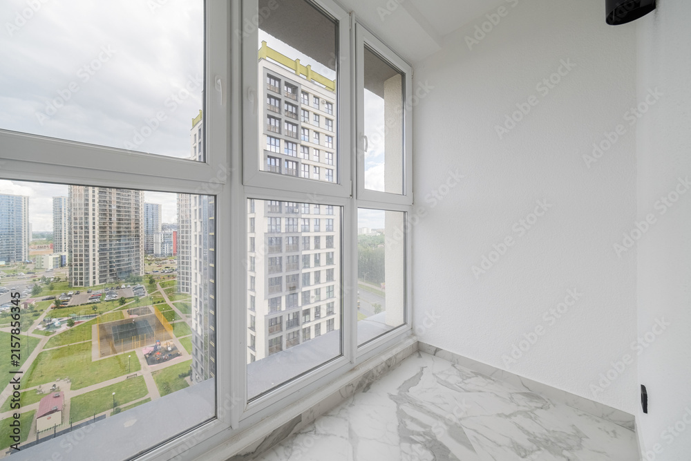 Fototapeta premium Panoramic windows overlooking city high-rise residential district
