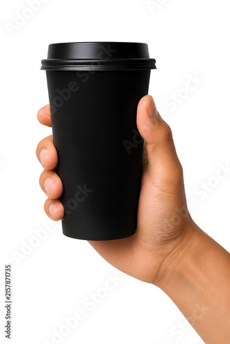 Hand holding black reusable coffee cup with lid for eco-friendly takeaway drinks isolated on transparent background