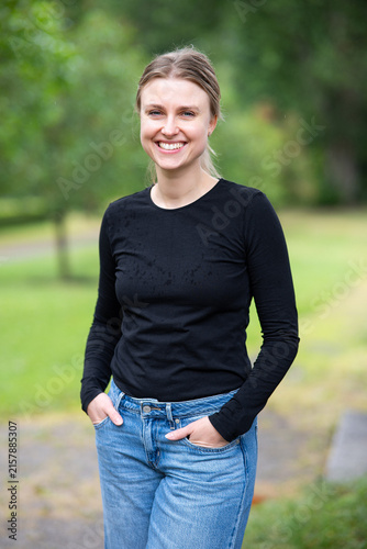 Portrait of beautiful smiling blonde young woman 