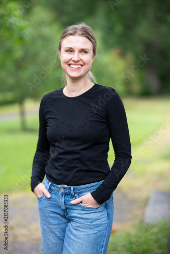 Portrait of beautiful smiling blonde young woman 
