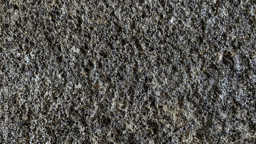Bild auf Leinwand Dark grey rough porous asphalt road surface texture background