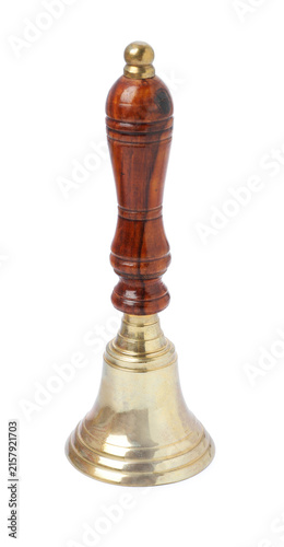 Foto One golden school bell on white background
