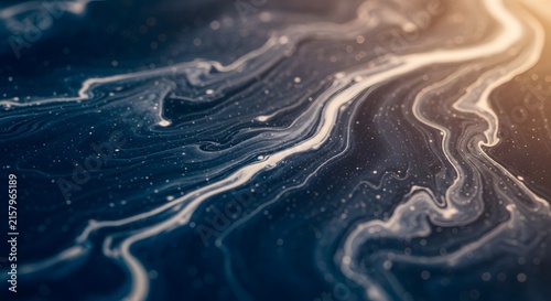 Abstract Swirling Patterns of Dark Blue and White Liquid.