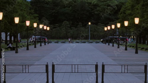 Twilight in Tokyo  :  Boulevard Lights Begin to Glow Amidst the Flow of Traffic, Commuters, and Joggers  |  Marunouchi, Tokyo, Japan