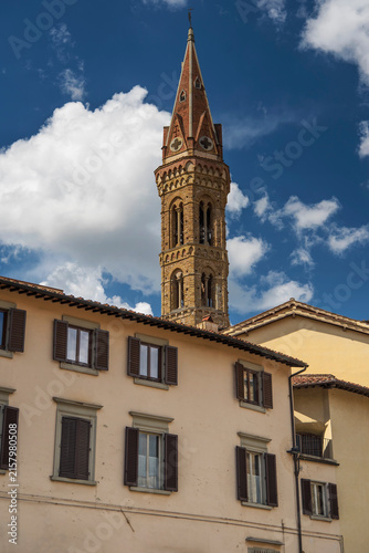 The Bell tower of Badia Fiorentina and residential buildings Florence italy