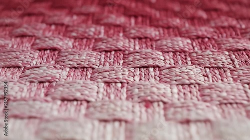 Macro Closeup of Red Woven Fabric Texture with Shallow Depth of Field, Detailed Textile Pattern