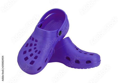 Canvastavla Pair of purple crocs for comfortable summer footwear with holes.