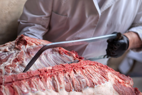 Preparing and cutting meat on the butcher's block